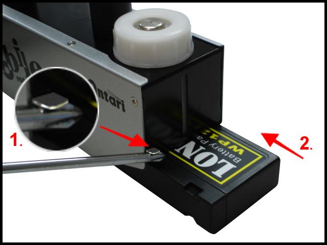 1. Lift-up the plate before inserting the battery. 2. Make sure the battery is inserted on the right position (see photo).
