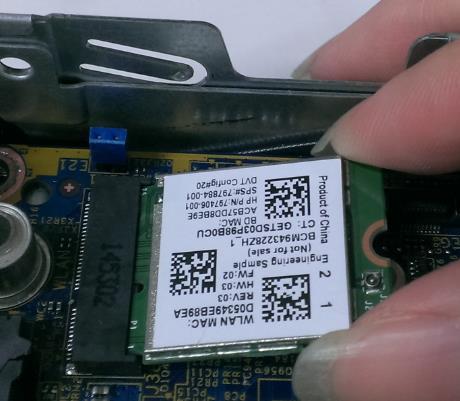 5. Remove WLAN Card from