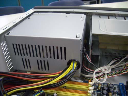 Place the Power Supply back to After secure the Power Supply with the mount, you