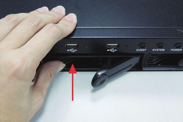 7. Once the HDD is placed in the tray, flip it over and