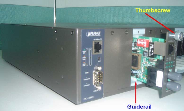 slot. Step 3- Slide the FST-80x Media Converter board into the