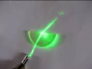 Draw a normal to the flat surface at its center. Step 2 Direct a beam of laser light such that it is incident along the normal.