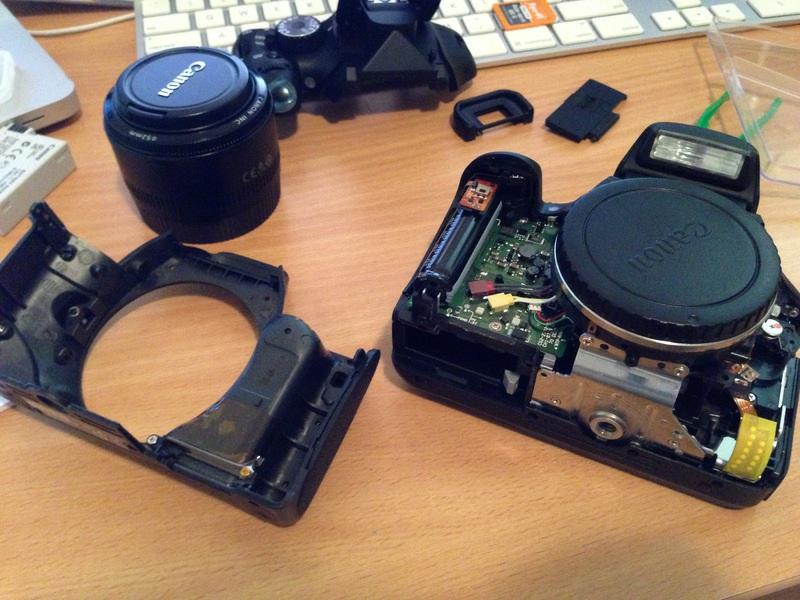 Do not remove the screws on the metal lens mount ring. Doing so may cause issues with autofocus. See that thing that looks like an AA battery?