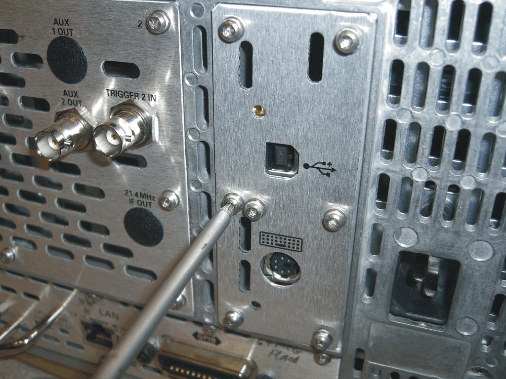 Installation Procedure 5. Put the rear plate in place on the PSA rear panel, and screw it into place as shown below. New screws are included in the kit. 6.