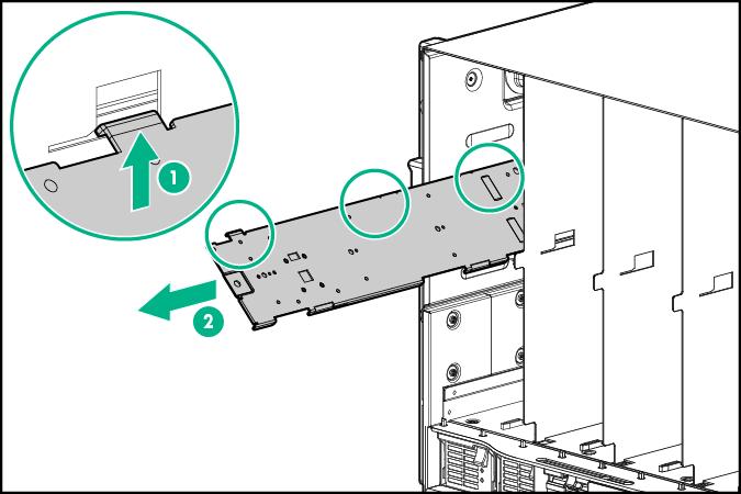 3. Lift the left side of the device bay shelf to disengage the three tabs