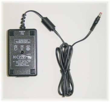 7.2 AC/DC Adapter Description The AC/DC Adapter runs off the power mains with the following specifications: a.