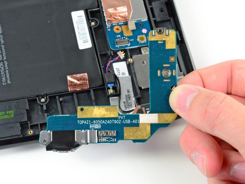 board. Remove the USB connector board from the TouchPad.