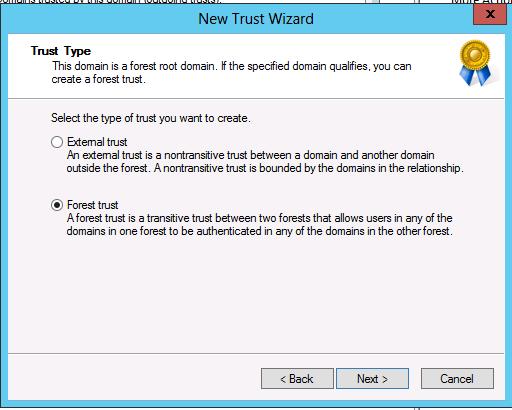 com). Figure 7-11: Creating a Trust - Specify the Domain 4. Select Forest trust.