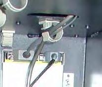 Route the 2 cables in the vault area (EJ to dispenser, dispenser power cable end) in the existing cabinet cable clips (Figure ). Figure 9. Ground wires installed. Dispenser power cable Figure 2.