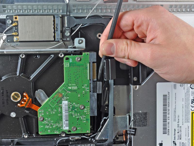 speed. Disconnect the thermal sensor by pulling its connector away from the side of the hard drive.