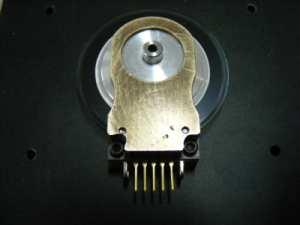 34 Tight the encoder optical module screws and remove the