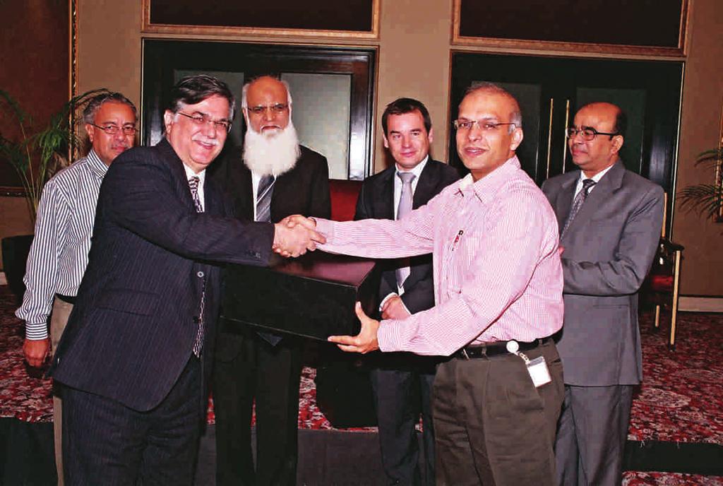 Shoaib Khan, Country Sales Executive, IBM Pakistan, Tahir Malik, Chairman/CEO,