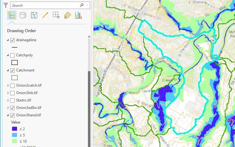 Note that the feature selected above is from the Catchment Feature Class. Identify the corresponding catchment delineated from the DEM in the Catchpoly layer.