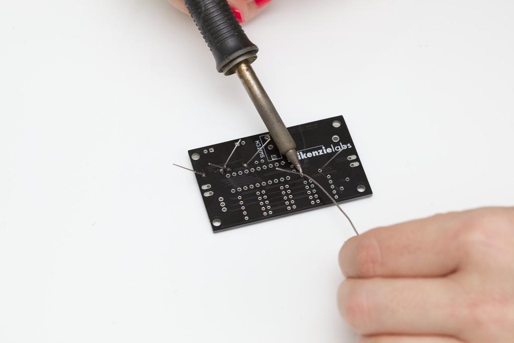 Be sure that the body of the resistor is flush against the PCB.