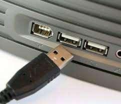 Plug the other end of the laptop cord into the wall outlet. 3.