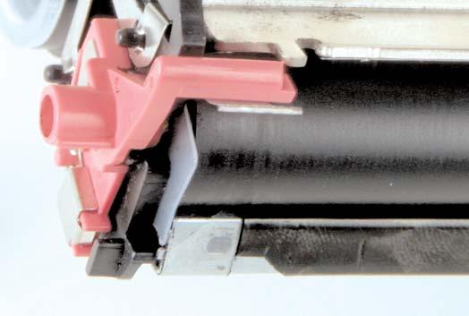 Drive Side Plastic Shim Contact Side Plastic Shim Figure 17 b. Re-install the developer roller into the hopper. Figure 18.