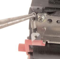 Note: Ensure the clear developer roller tension strip is in front of the tension clip. See Figure 20.