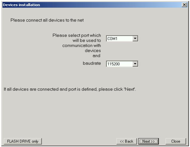 Fig. 2.1. Selection of serial port and baud rate After defining the communications port and baud rate, go to device detection screen (Fig. 2.2) by clicking on the [Next>>] button.