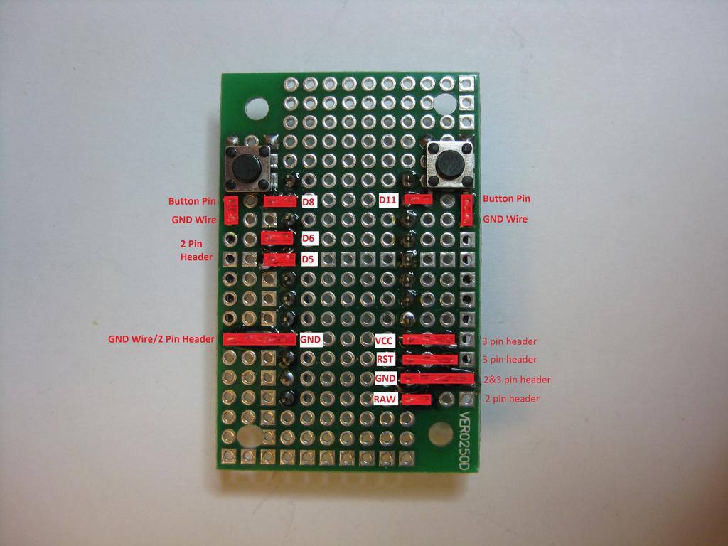 Turn the protoboard over so you are looking at the bottom side again.