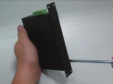 1 2 Step 5: Lightly pull out the bottom of the switch for removing it from the track. 2.2.2 Wall-mount Plate Mounting To install the Industrial Gigabit Ethernet Switch on the wall, please follow the instructions described below.