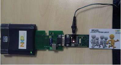 Connect the evaluation board to the card adapter via the serial interface. The DESFIRE Card should be put on the Contactless reader Interface of the Evaluation board.
