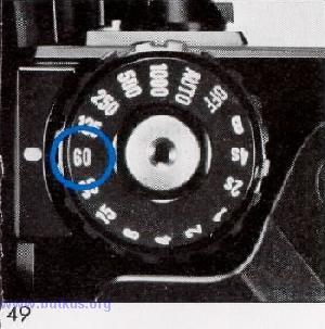 The Power Winder, designed with latest electronic technology, employs a special computer "memory" chip which monitors key functions essential to motorized photography (Fig. 50).
