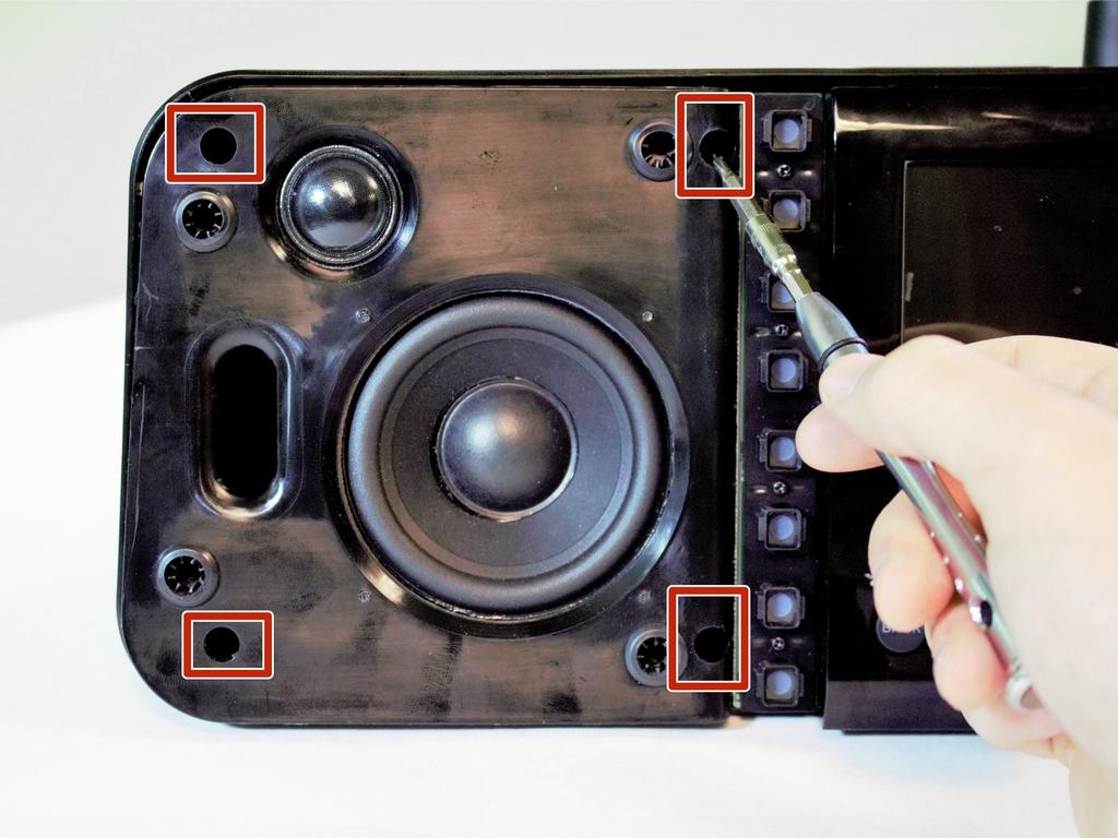 Step 3 Remove (4) screws (14 mm) with a PH1 screwdriver on the front panel by the speaker.