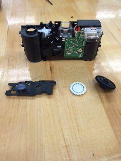 Parts grouped by camera s subsystem/functions: The photograph above shows the disposable camera partially