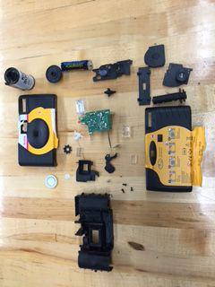This picture shows all of the dissembled part of the disposable camera.
