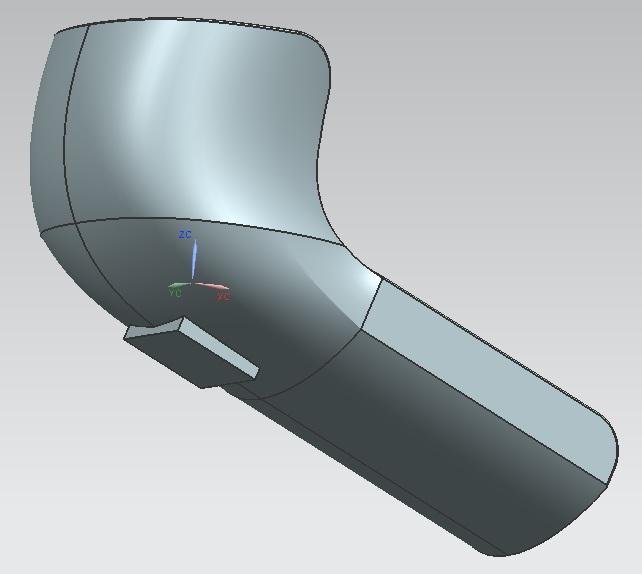 command was used to delete the portion of the square extrusion that was extended into the interior of the knee part.