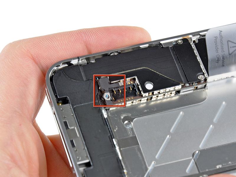 Before reconnecting the battery connector, be sure the contact clip (shown in red) is properly positioned next to the battery connector.