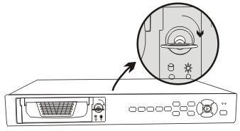 Slide the drawer into the removable hard drive case, and lock the drawer. 14.