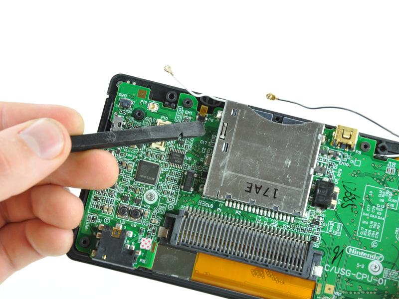 Nintendo DS Lite Motherboard Replacement Step 13 Use your fingernail or the edge of a spudger to carefully flip up