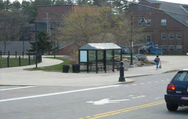 The inbound shelter has a curb cut from the front in to it and the rear is a flat entrance in.