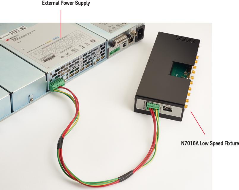 Setting up the N7015A/16A Type-C Test Kit NOTE Port 2 of the N7016A low speed fixture can be used to connect a type-c device such as a power delivery controller, a monitor, or a