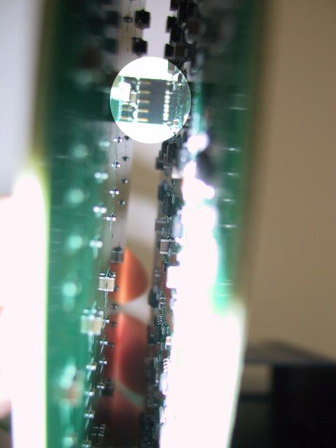 3 From the opposite side of the circuit board, check to make sure that both rows of pins are correctly inserted in the