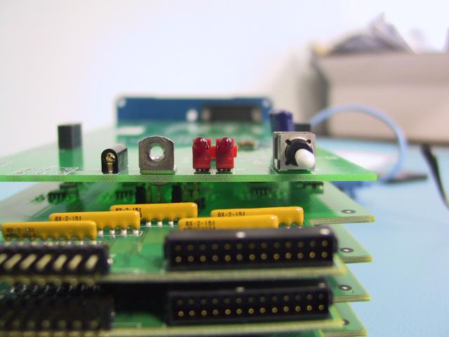 6 The two LEDs at the front of the main board must be seated on the surface of the main board before you