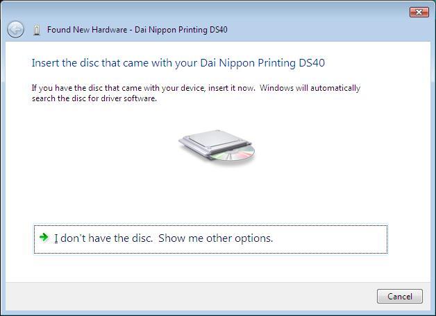 If the message Insert the disc that came with yuor Dai Nippon Printing DS40 appears, click