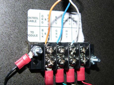 Inside the scoreboard, connect the control cable leads to the appropriate terminals on the terminal block, according to the label above the terminal block.