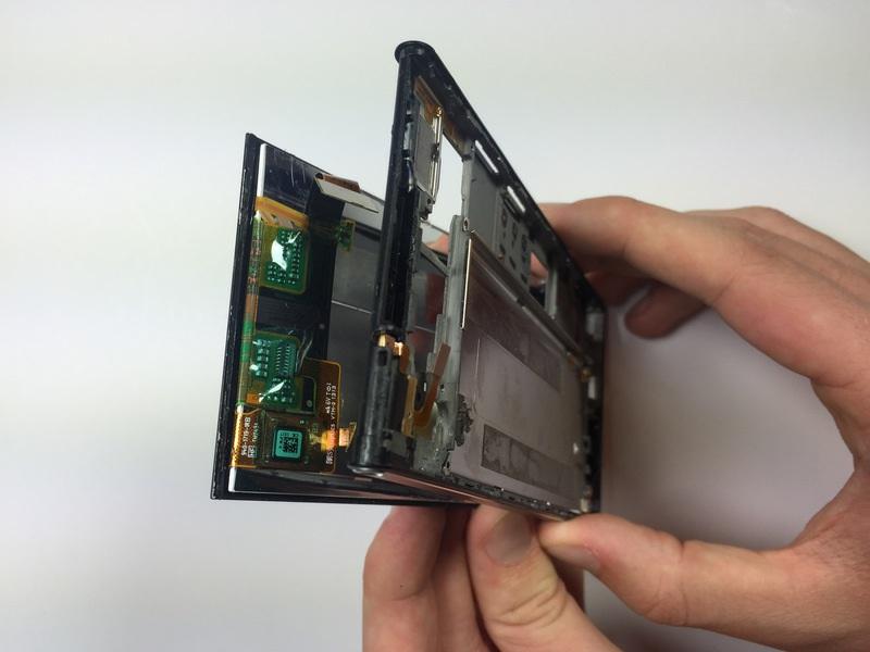 This can damage the screen along with the internal wiring. Take this step very slowly, and go back to remove any extra adhesive if necessary.