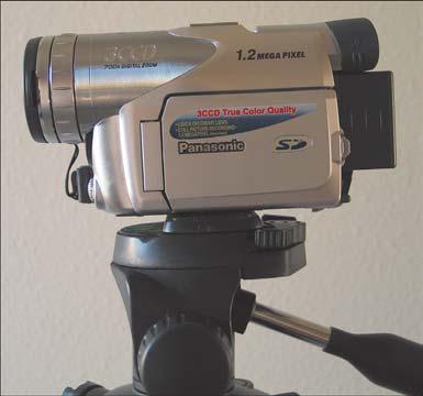 8 Using the Zoom Feature PART Open Turn On Mount the camcorder on your tripod. Open the LCD display.