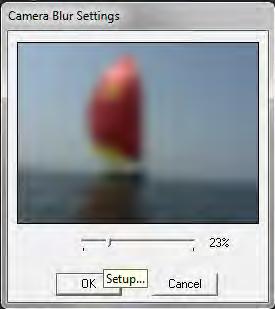 Make sure the clip in the sequence is selected. In the Effects panel Blur & Sharpen bin, drag Camera Blur to the Effect Controls panel.