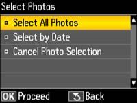 Press the Menu button, select Select Photos, and press the OK
