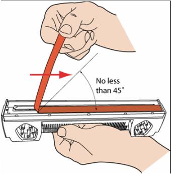 With the other hand; grasp the strip tab and slowly peel the strip, at an angle (90 to 45 ), from the printhead nozzles. DO NOT pull the strip off at an angle less than 45 with the printhead surface.