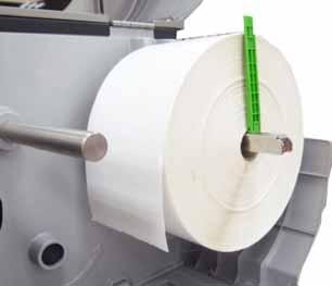 Move the label roll guard horizontally to gently fit
