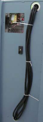 9. Zip-tie the five black cables as tightly as possible against the side wall as shown in Figure 46. 10.