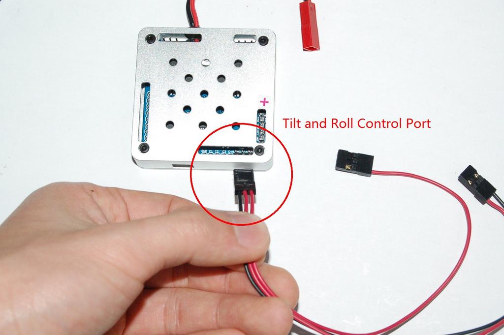 Insert the Tilt and Roll Controlling Connector into the Til and Roll Control Port on the Gimbal