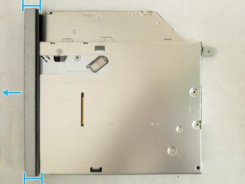 Remove the optical-drive bracket from the
