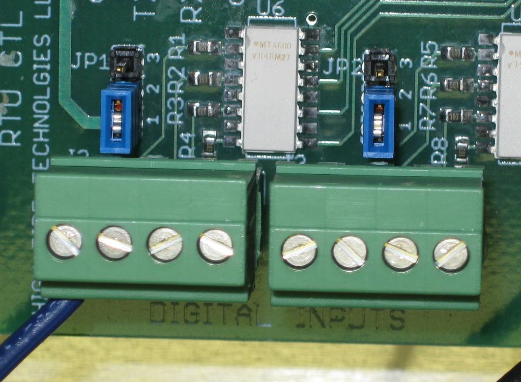 Figure 3 Discrete Input Jumpers When JP1 or JP2 are in the 1-2 position then a ground connection to the input will be active.