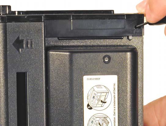 Place the cartridge with the handle/supply chamber facing you.